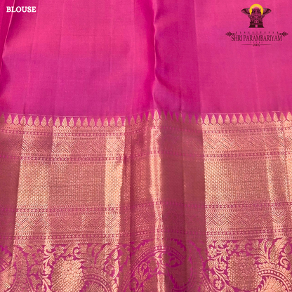 A bright and rich deep pink (rani pink) with radiant gold zari work Saree