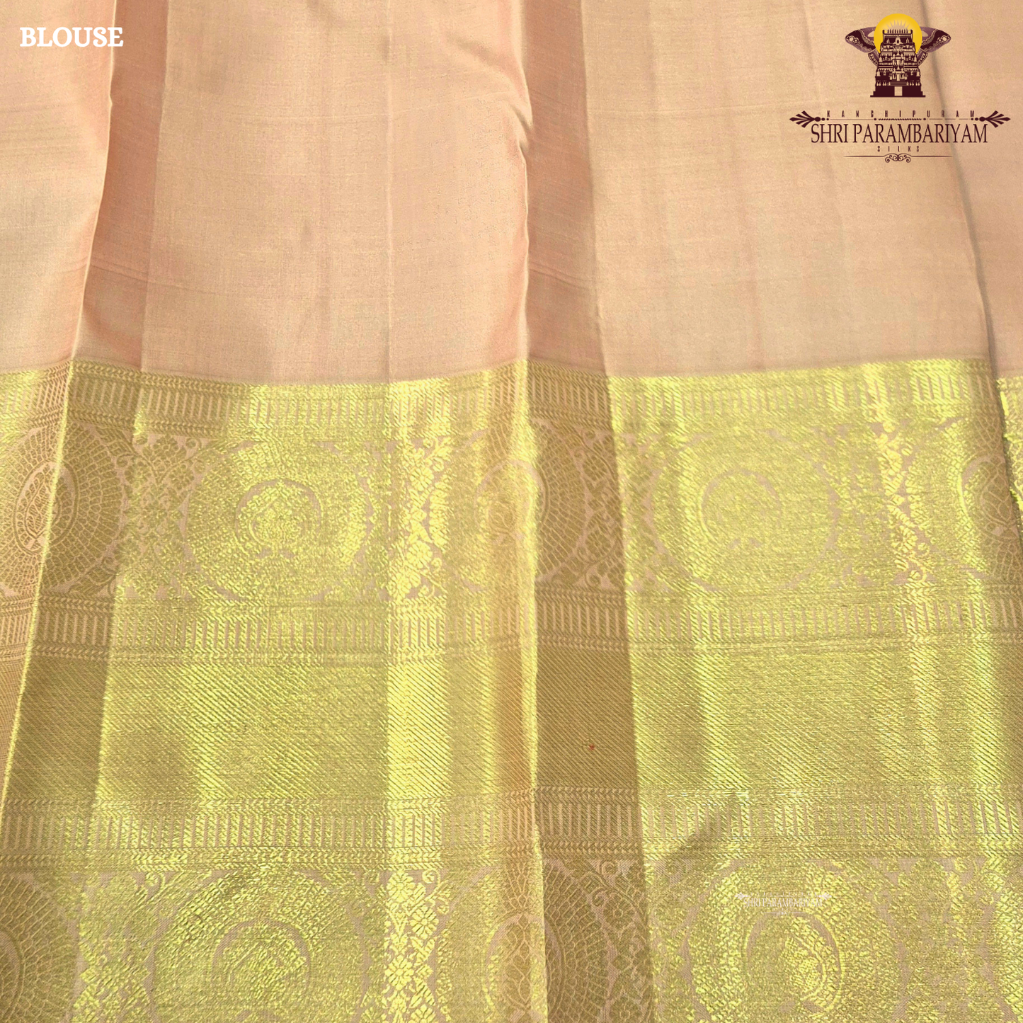 A elegant Soft Peach with Rich Gold Zari Saree