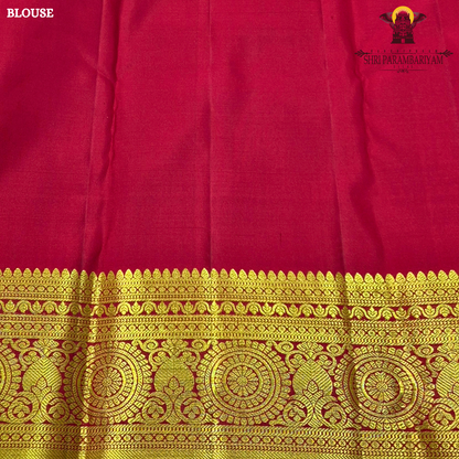 Bright vermilion red with rich antique gold zari accents Saree