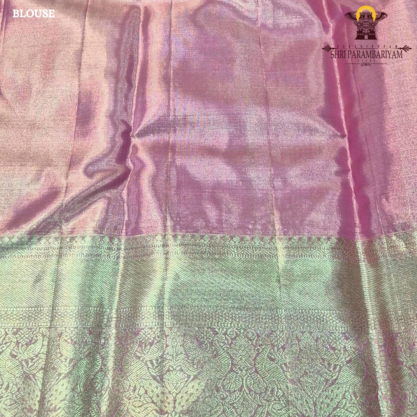 A graceful rose pink shade blended with antique gold tissue weaving Saree