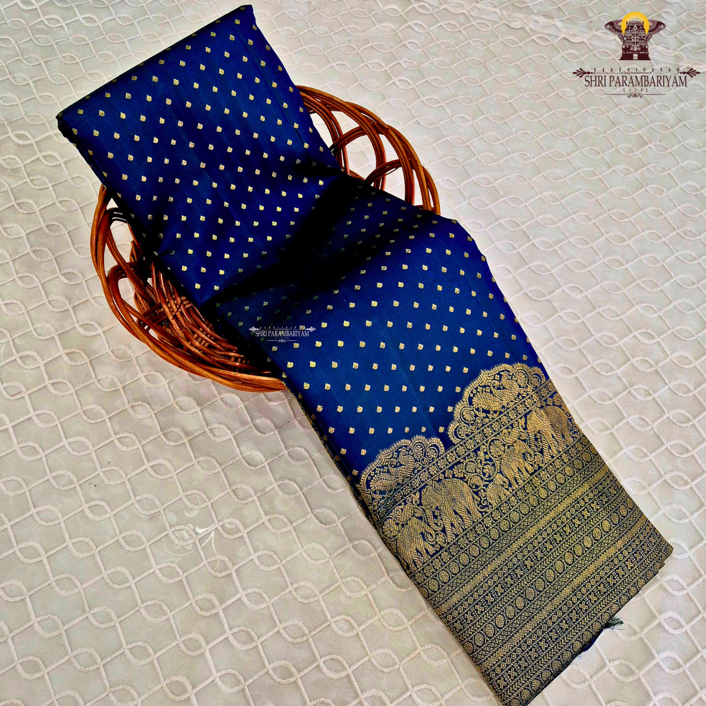 A rich Royal Blue (deep cobalt/navy-blue tone) with antique gold zari Saree