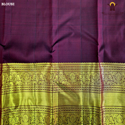 A rich wine maroon body with elegant gold zari butta Saree