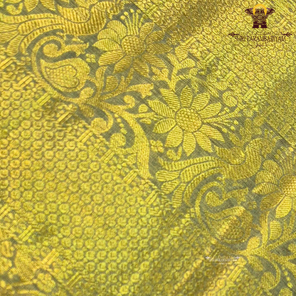 Rich antique gold with a subtle yellow-gold tone Saree