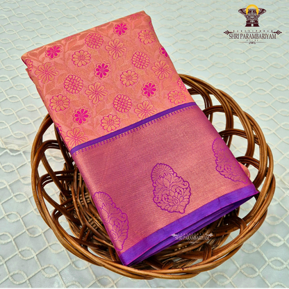 Soft coral-peach with a gentle tissue sheen Saree