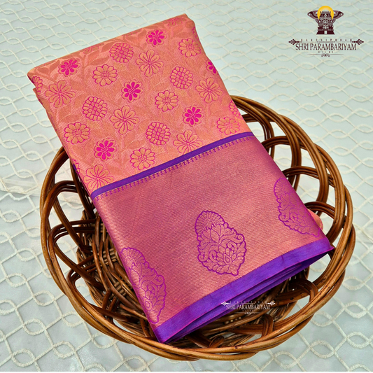 Soft coral-peach with a gentle tissue sheen Saree