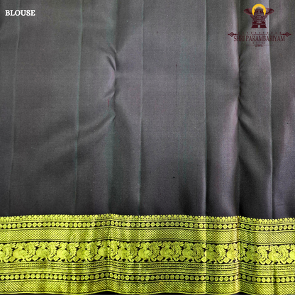 A rich rust orange / deep vermilion shade with a subtle silk sheen Saree