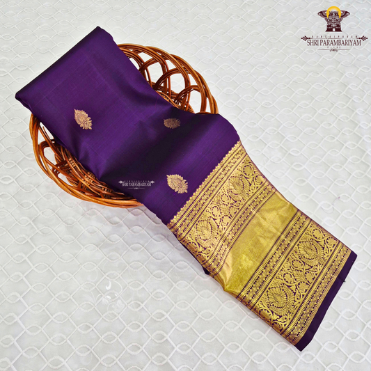 A regal Royal Purple (Deep Violet) shade, exuding timeless elegance Saree