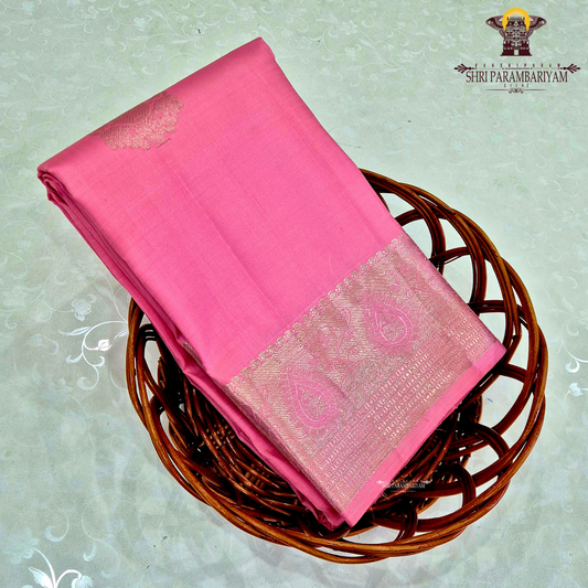 A soft and elegant rose pink / candy pink shade with a smooth silk sheen Saree