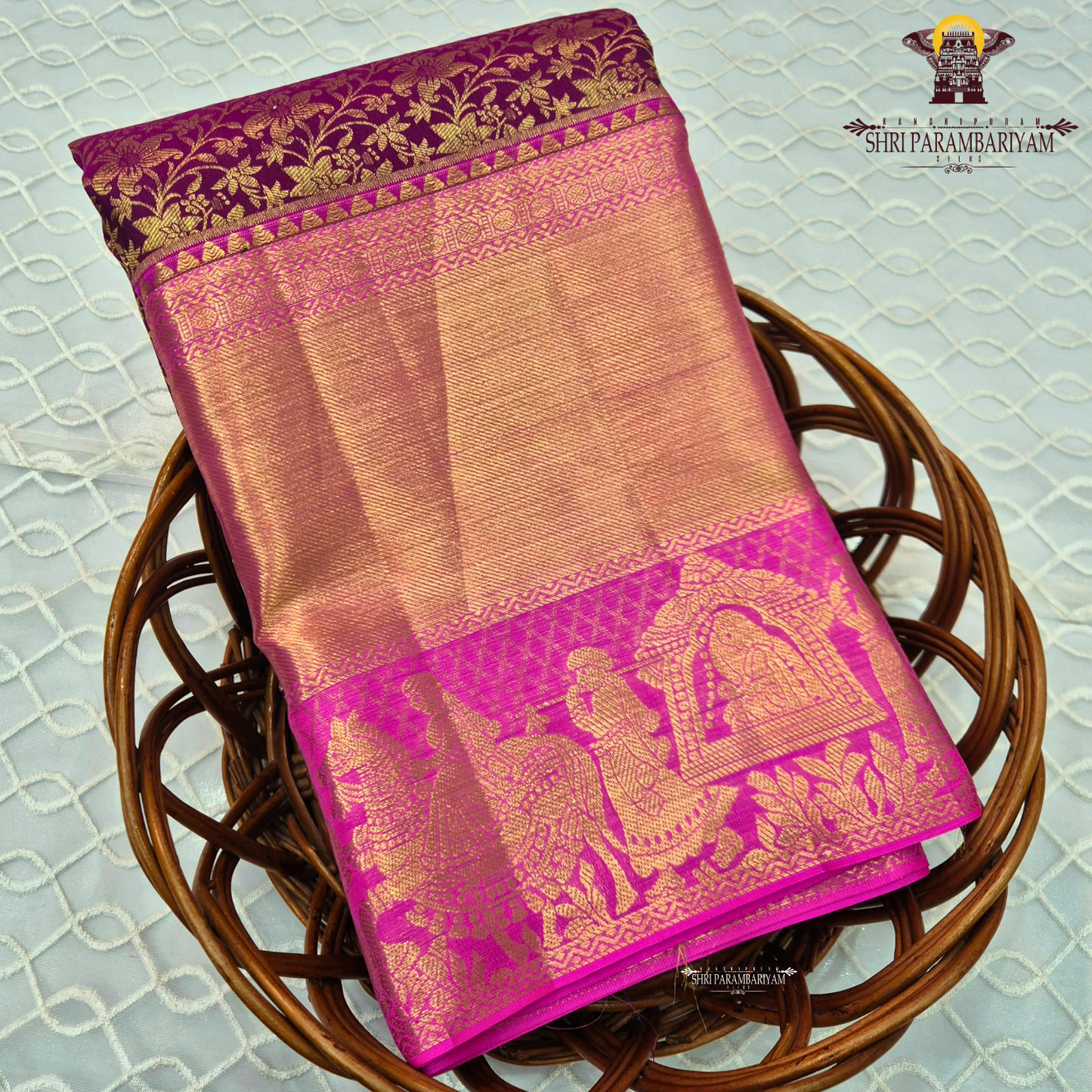 A graceful peachy gold (soft rose gold) body paired with a rich rani pink (bright magenta) Saree
