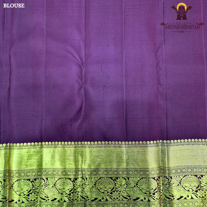 A vibrant brick red body with a rich gold zari border and pallu Saree