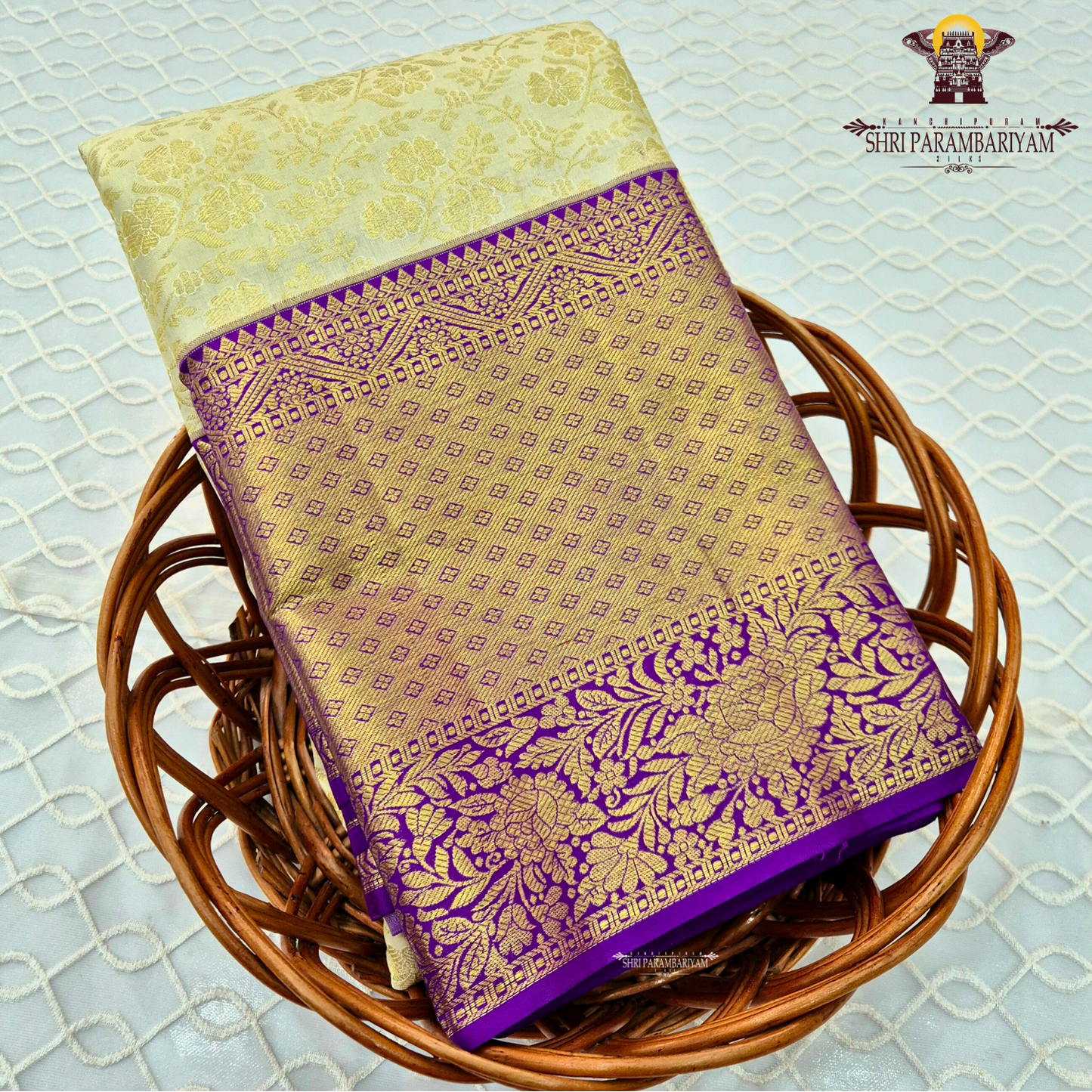 Soft light gold / cream with Rich royal purple (violet) border Saree