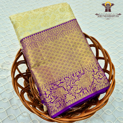 Soft light gold / cream with Rich royal purple (violet) border Saree