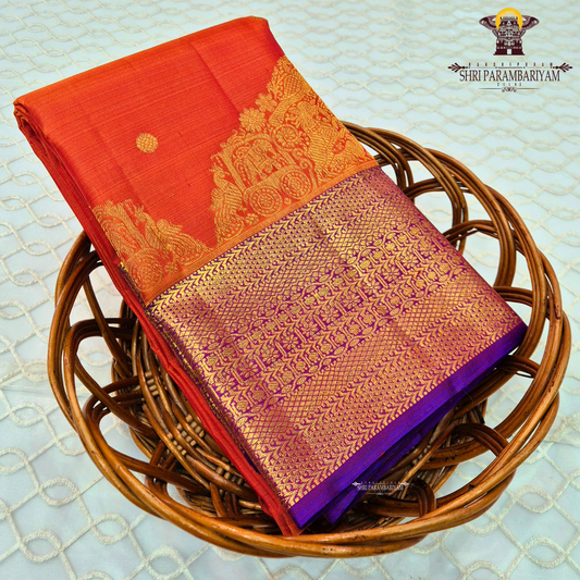 Vibrant reddish-orange (vermilion tone) body with a contrasting Saree