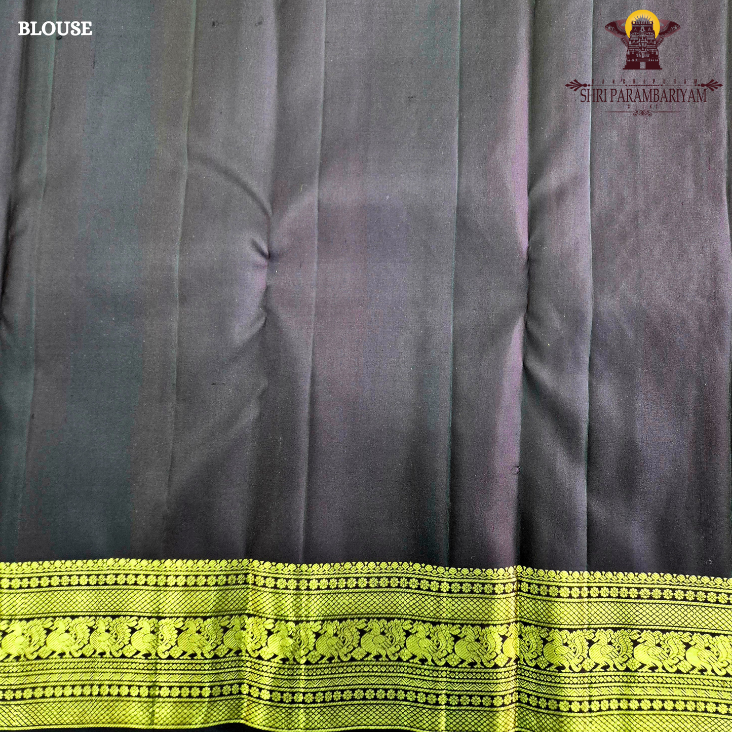 A graceful olive green / moss green shade with a soft natural sheen Saree