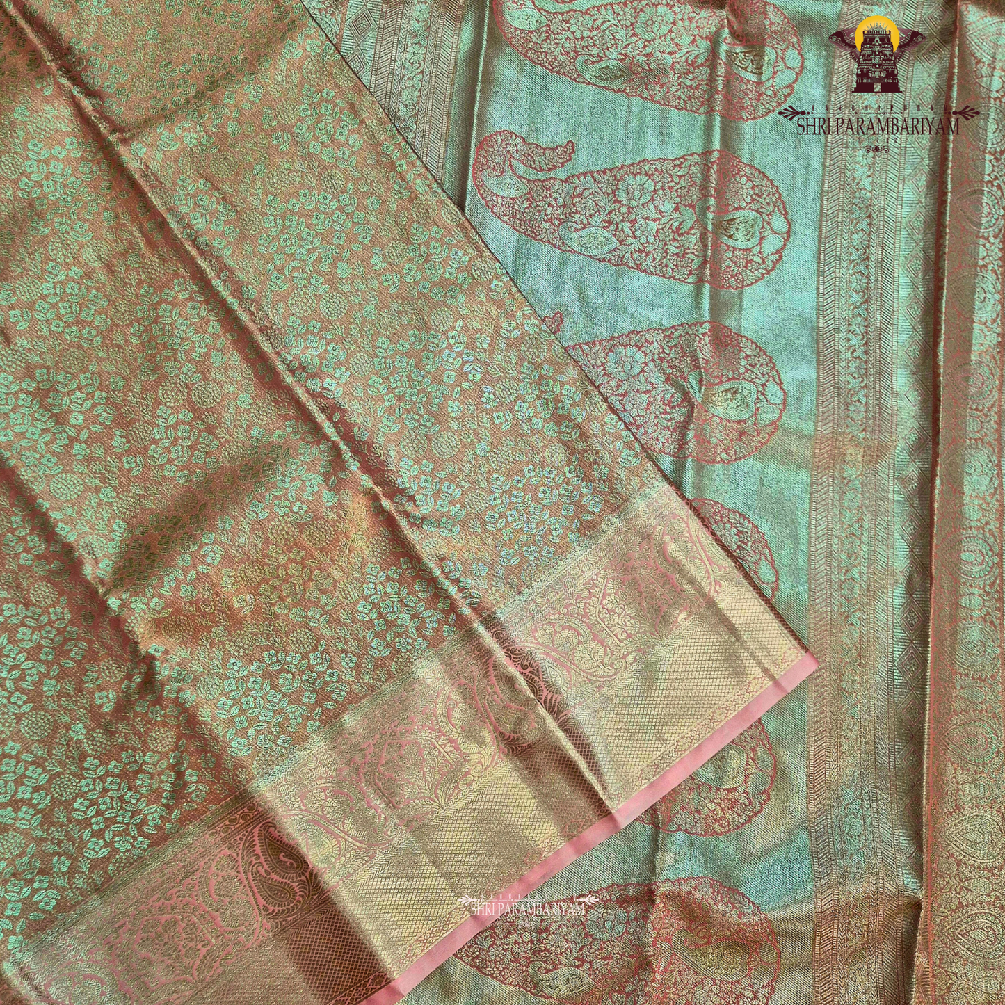 Soft blush pink with an elegant metallic tissue sheen Saree