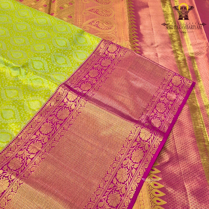 Vibrant lime green with rich pink contrast and golden zari Saree
