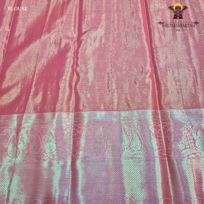 Soft blush pink with an elegant metallic tissue sheen Saree