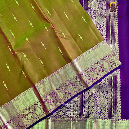 A rich antique mustard / golden olive shade with a warm undertone Saree