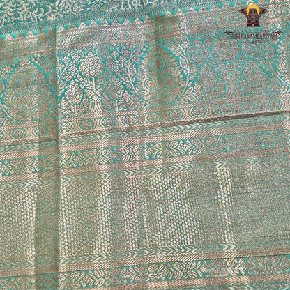 Serene sea-green / aqua teal with a soft metallic tissue sheen Saree