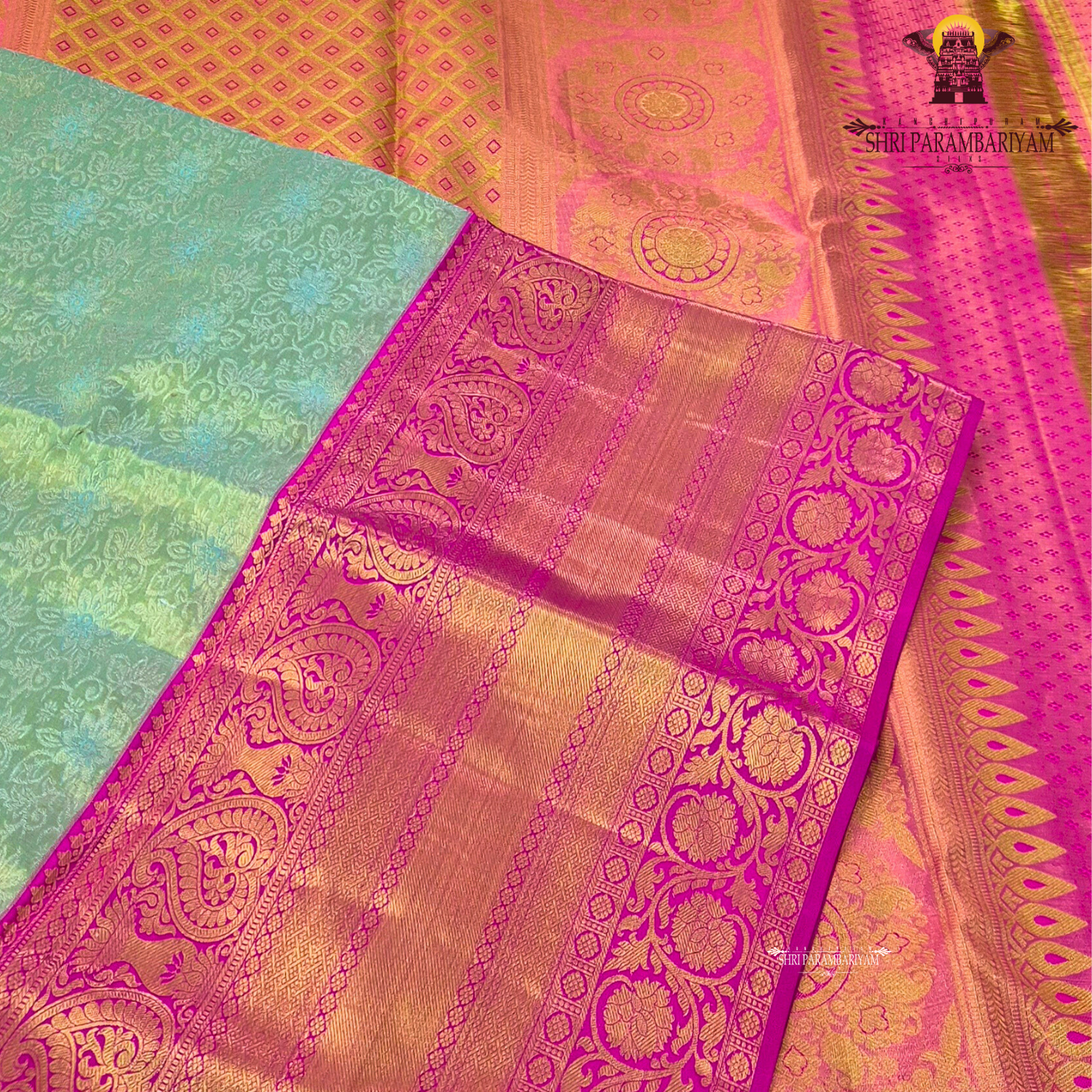 Soft pastel green with vibrant pink contrast and golden zari Saree