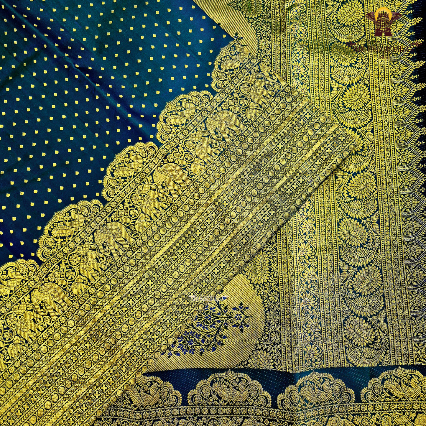 A rich Royal Blue (deep cobalt/navy-blue tone) with antique gold zari Saree