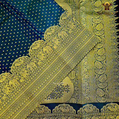A rich Royal Blue (deep cobalt/navy-blue tone) with antique gold zari Saree
