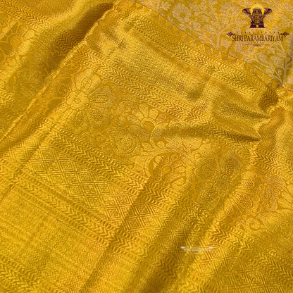 A rich mustard gold shade that radiates a classic and festive glow Saree