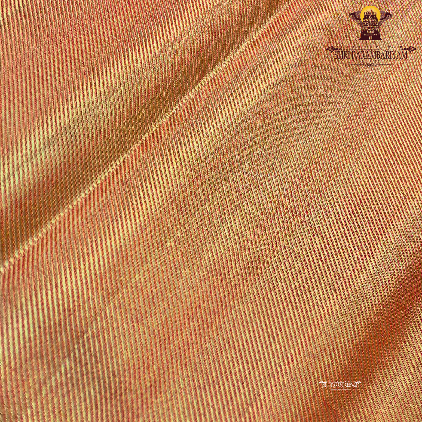 A beautiful peach gold shade blended with a soft pink undertone Saree