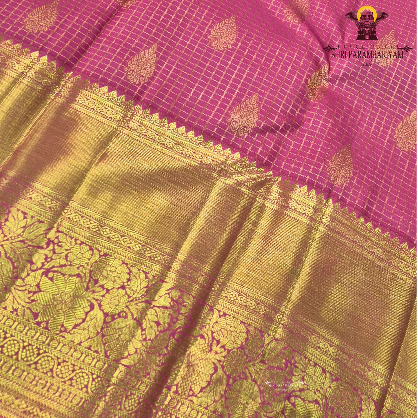A vibrant bubblegum pink / rose pink body paired with a rich golden zari pallu and border Saree