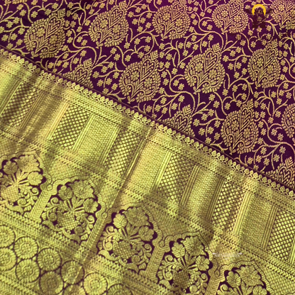Rich maroon / deep wine purple with luxurious gold zari work Saree