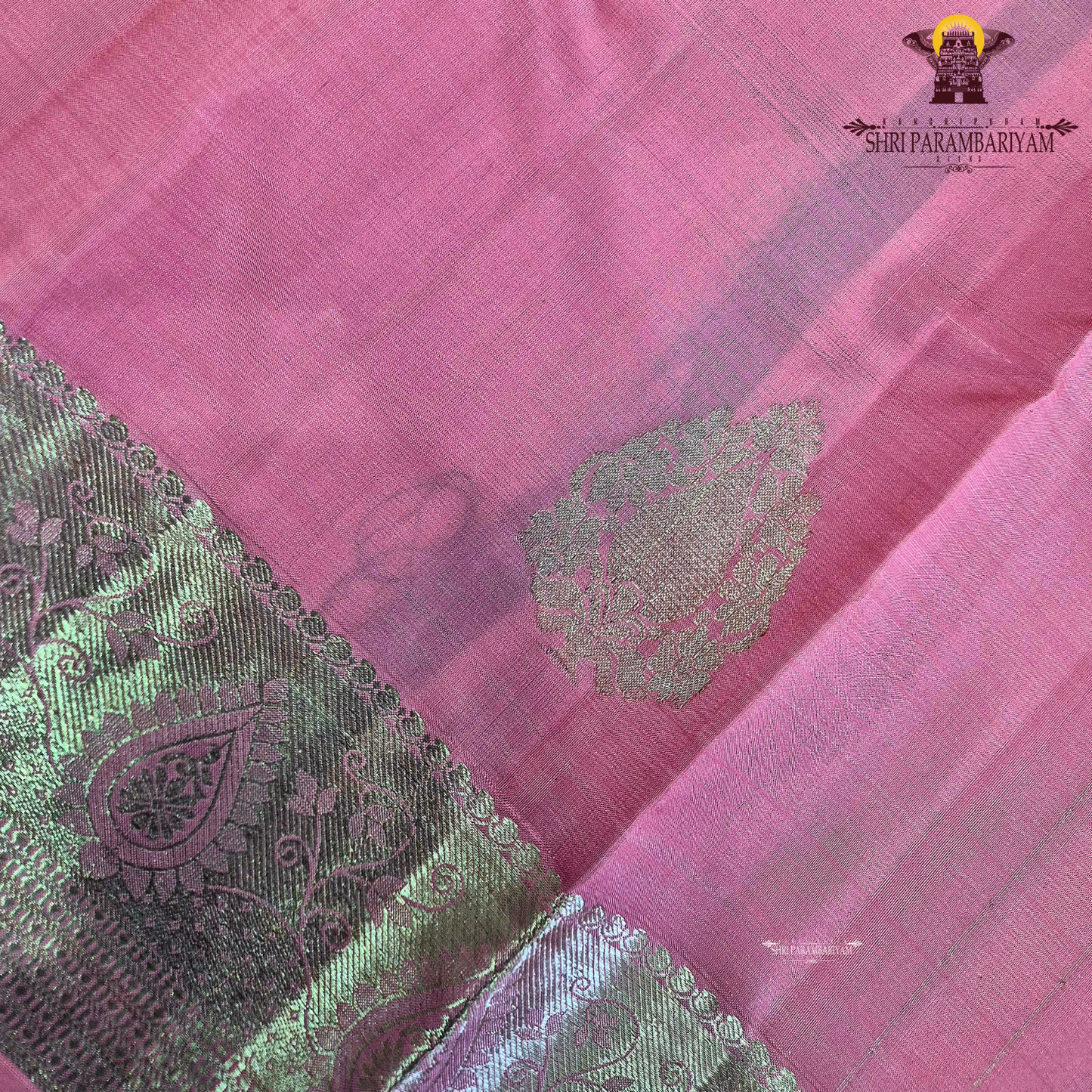 A soft and elegant rose pink / candy pink shade with a smooth silk sheen Saree