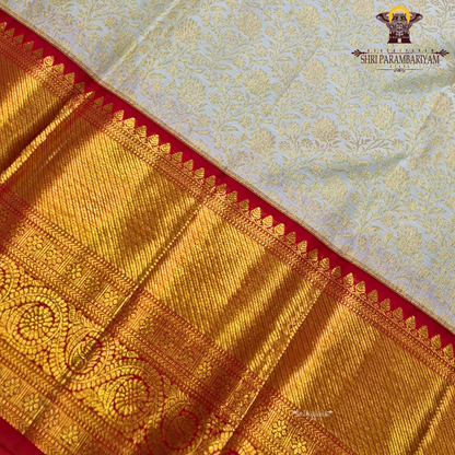 Classic half white (ivory/off-white) body with Bright contrast red border Saree