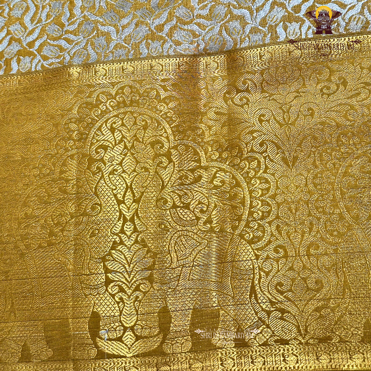 Rich mustard gold with a soft metallic tissue finish Saree