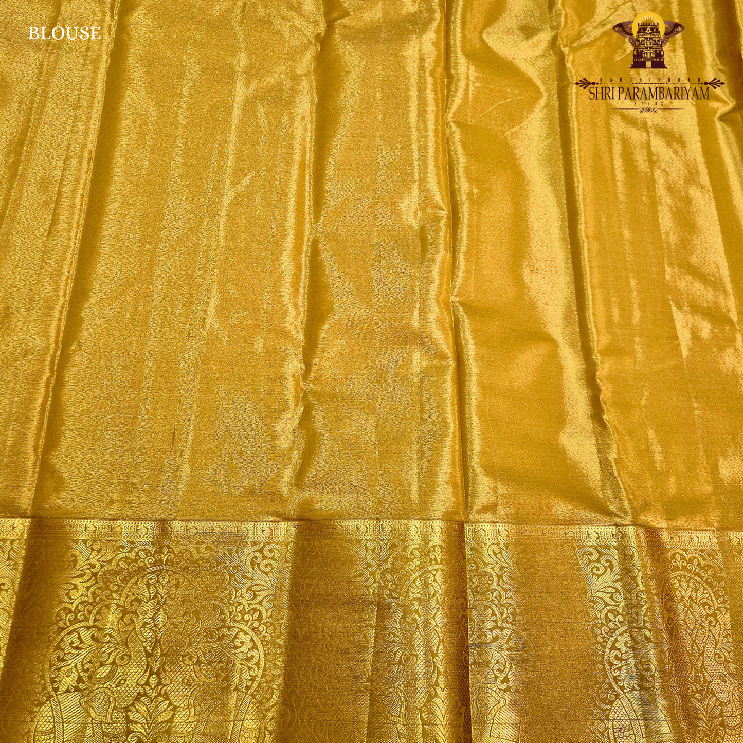 Rich mustard gold with a soft metallic tissue finish Saree