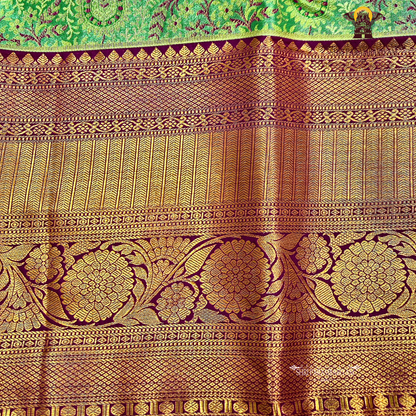 A beautiful peacock green Tissue Saree