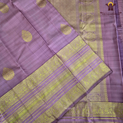 A vintage Rose Pink / Dusty Mauve Pink with an elegant silk sheen Saree