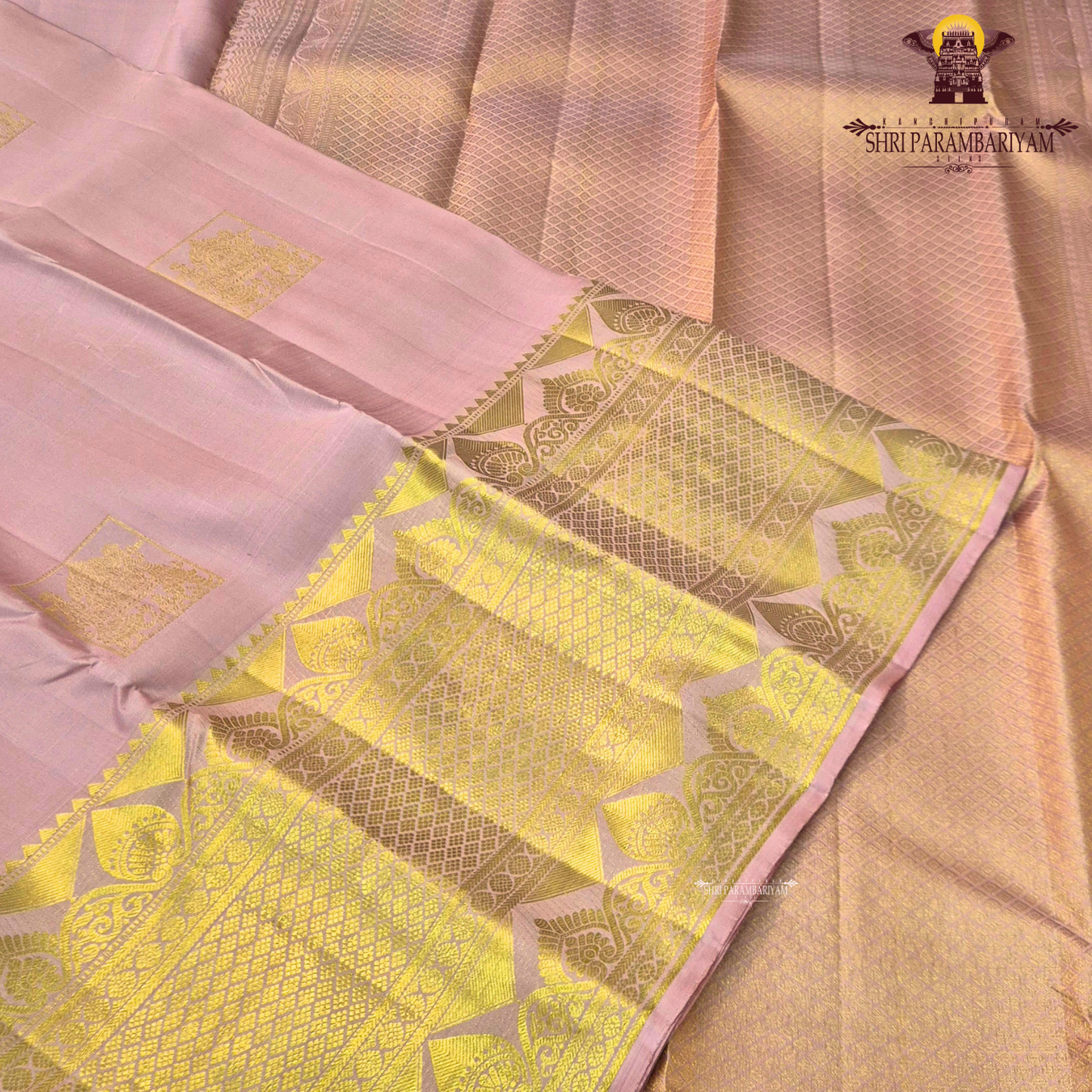 A elegant Baby Pink with Rich Gold Zari Saree