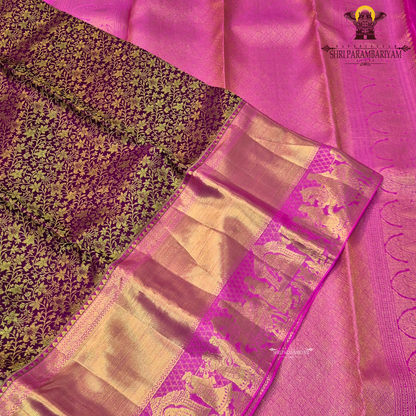 A graceful peachy gold (soft rose gold) body paired with a rich rani pink (bright magenta) Saree