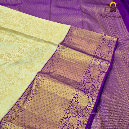 Soft light gold / cream with Rich royal purple (violet) border Saree