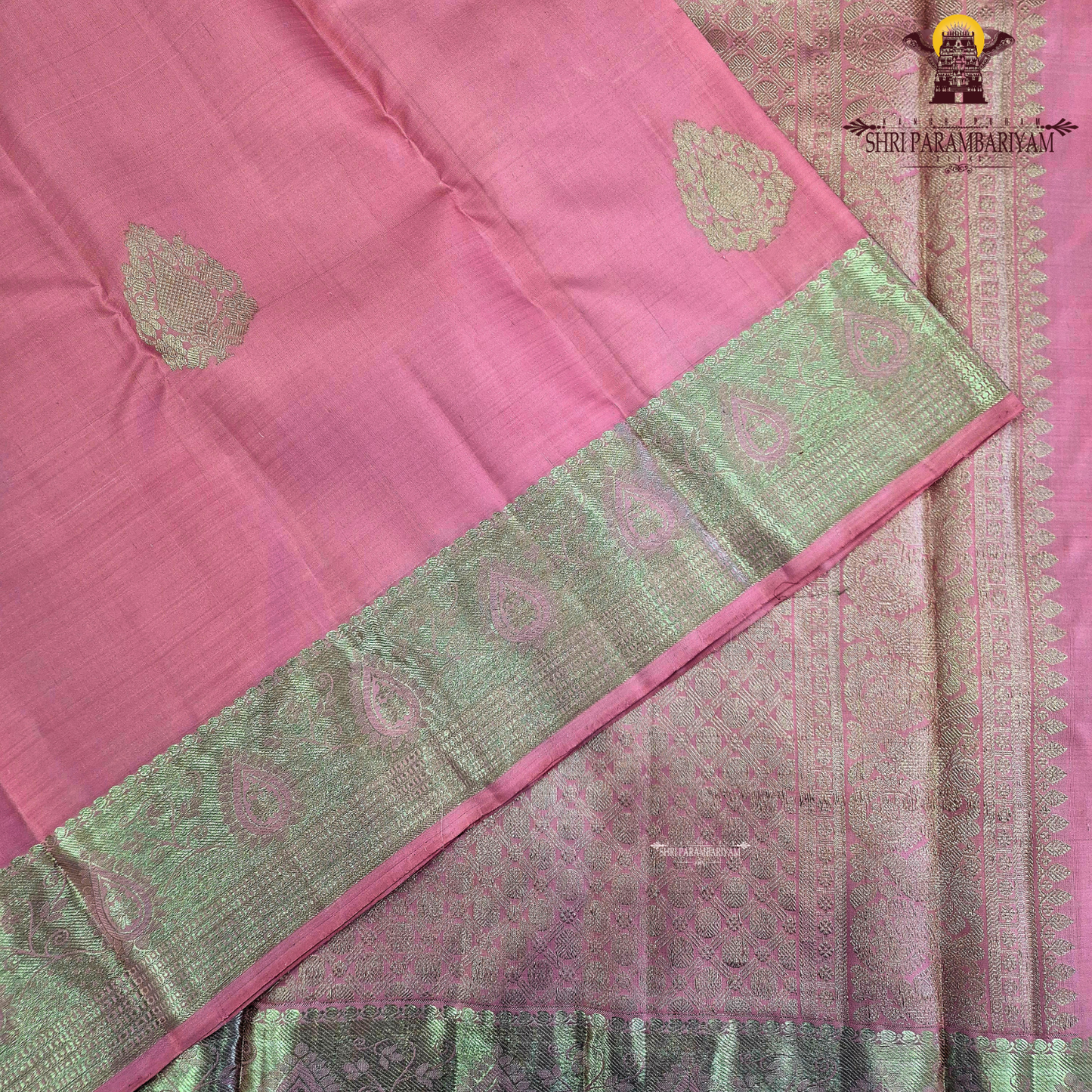 A soft and elegant rose pink / candy pink shade with a smooth silk sheen Saree