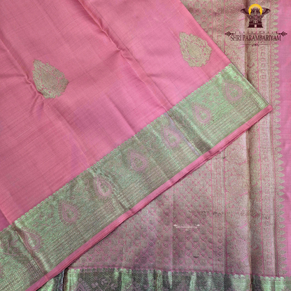 A soft and elegant rose pink / candy pink shade with a smooth silk sheen Saree