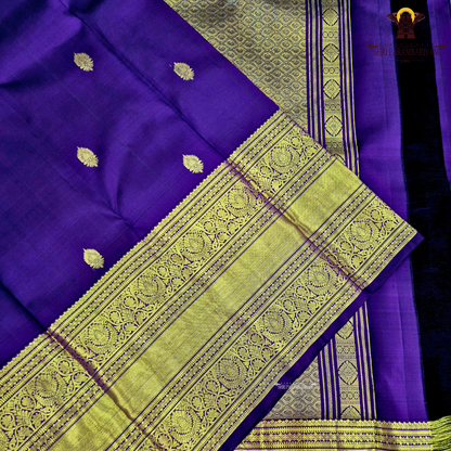 A regal Royal Purple (Deep Violet) shade, exuding timeless elegance Saree