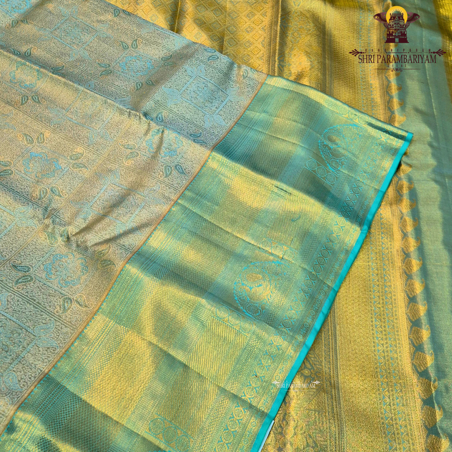 A refreshing sea green shade beautifully blended with rich gold tissue Saree