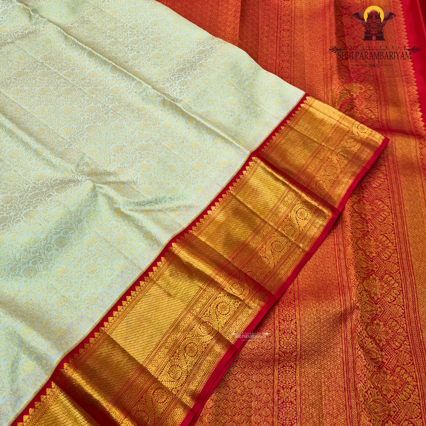 Classic half white (ivory/off-white) body with Bright contrast red border Saree