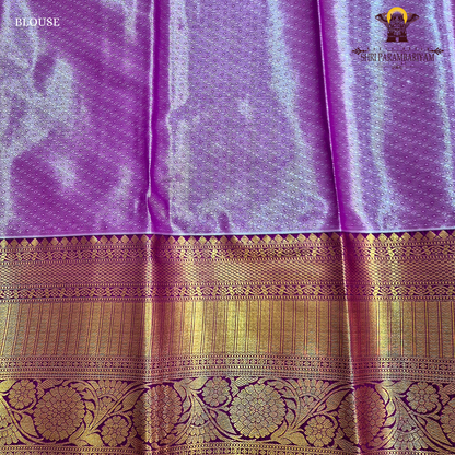 A beautiful peacock green Tissue Saree