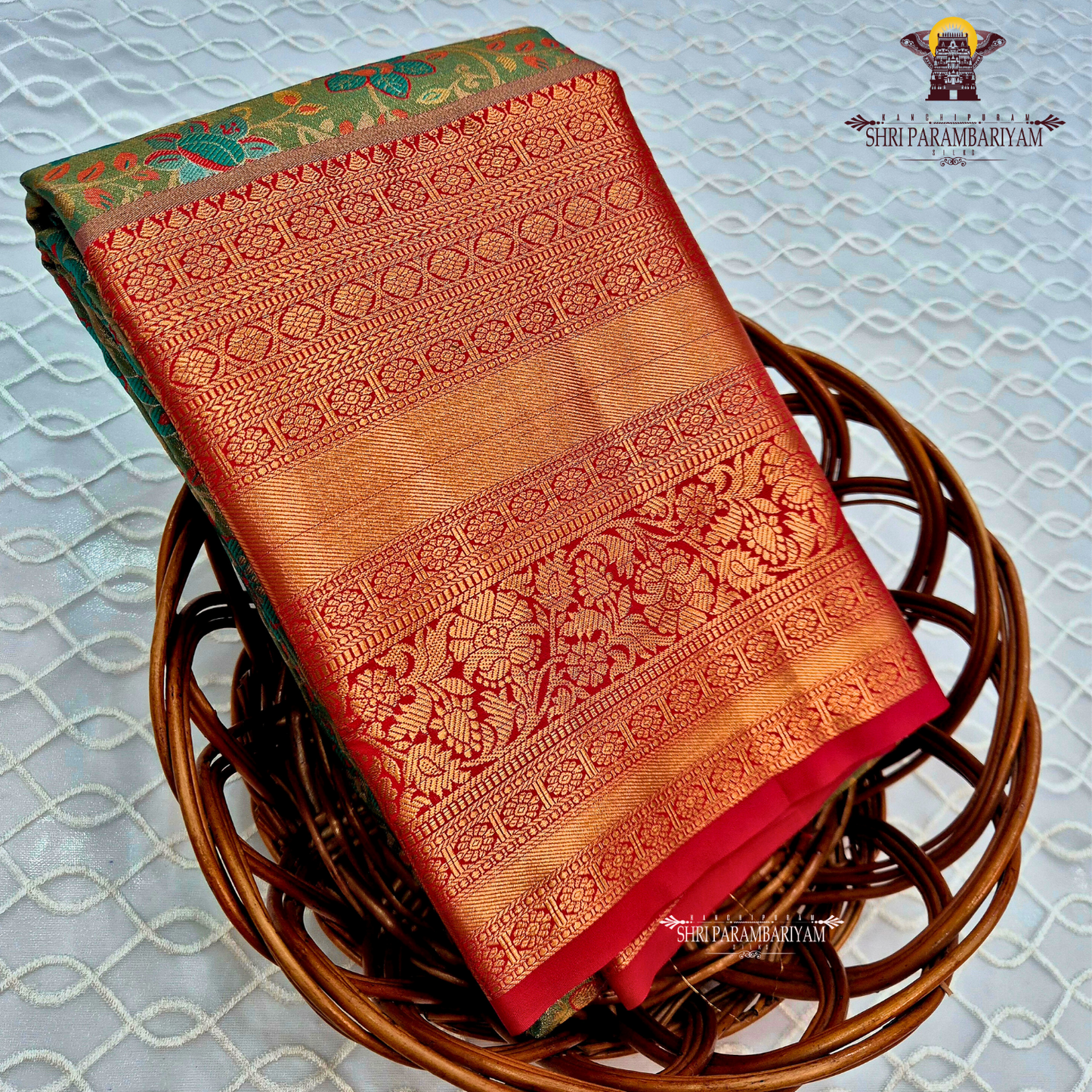 A classic olive green / moss green Saree