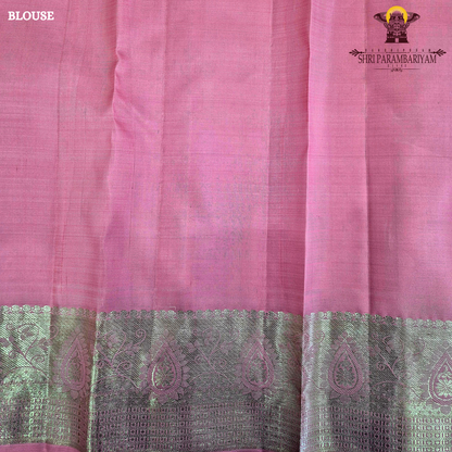 A soft and elegant rose pink / candy pink shade with a smooth silk sheen Saree