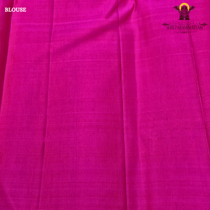 A rich emerald green body highlighted Saree
