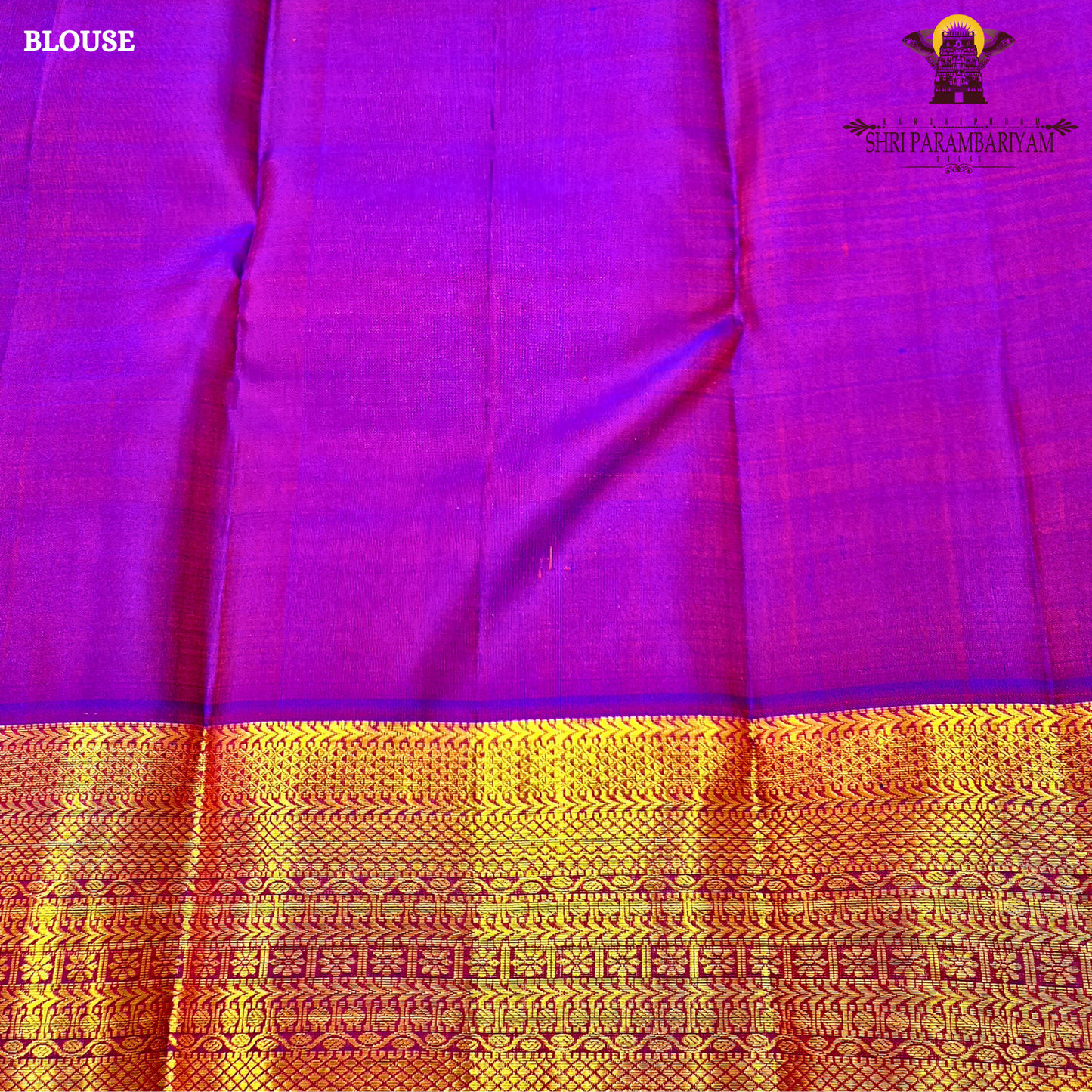 Vibrant reddish-orange (vermilion tone) body with a contrasting Saree