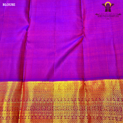 Vibrant reddish-orange (vermilion tone) body with a contrasting Saree